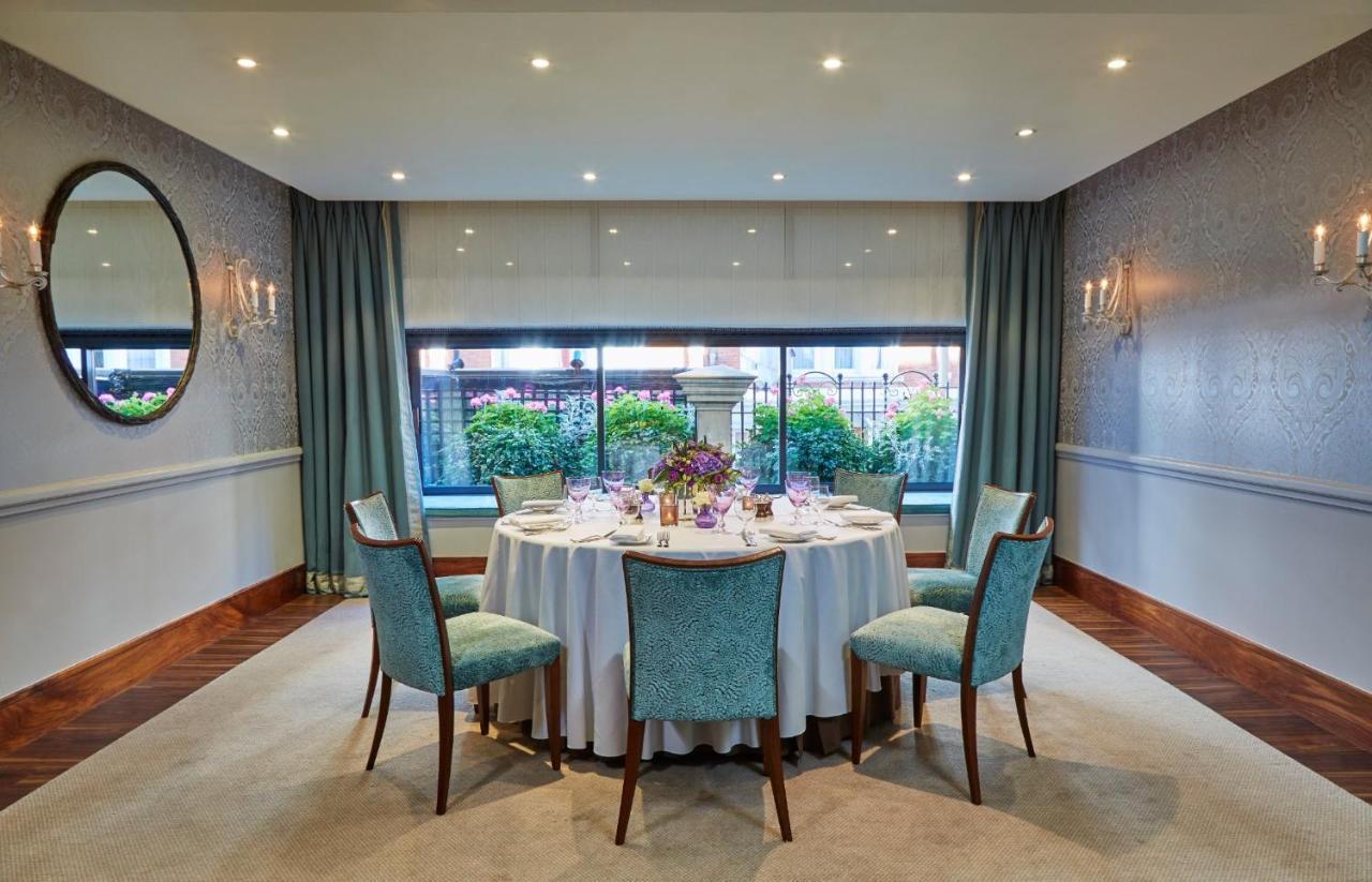 The Capital Hotel, Apartments & Townhouse Лондон Екстер'єр фото The dining room at the 100 Queen's Gate
